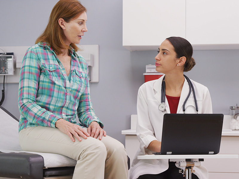 A woman in consultation in a medical office